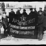 Bolshevist flag captured by the Polish troops near Pinsk at the edge of the Pripet marshed photographed by the Red Cross camera man outside the headquarters in Brest-Litowski.